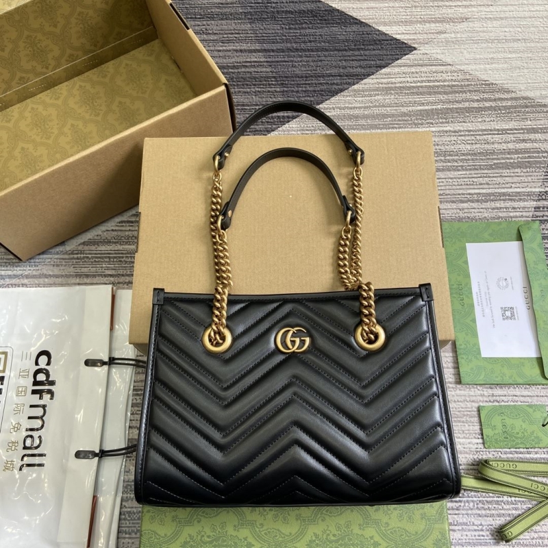 G*u*i shopping bags